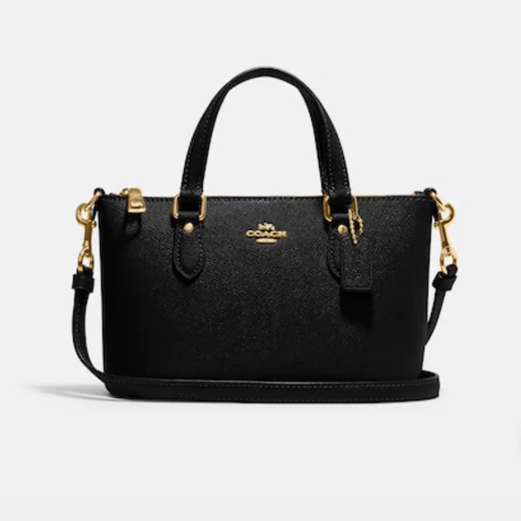 Coach black and gold purse hotsell